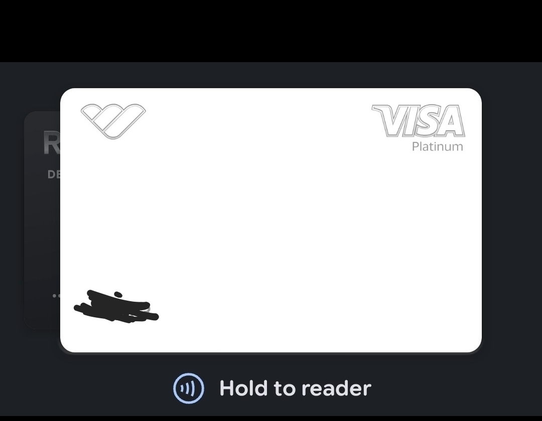 The Whop Card Visa Platinum debit card displayed live in the Whop app, with the card number redacted for privacy